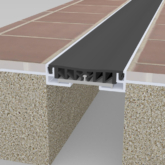 Wabo®CorridorWrap interior carpet floor flush mounted expansion joint cover system by Sika Emseal