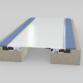 Wabo SeismicFloor (FNB) seismic interior floor expansion joint cover flush mount system in carpet