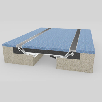 Wabo®SeismicPan (SPJ) seismic floor interior pan expansion joint cover with flush installed carpet flooring by Sika Emseal