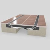 Wabo®SeismicPan (SPJ) seismic floor pan expansion joint cover with flush installed tile terrazzo flooring by Sika Emseal